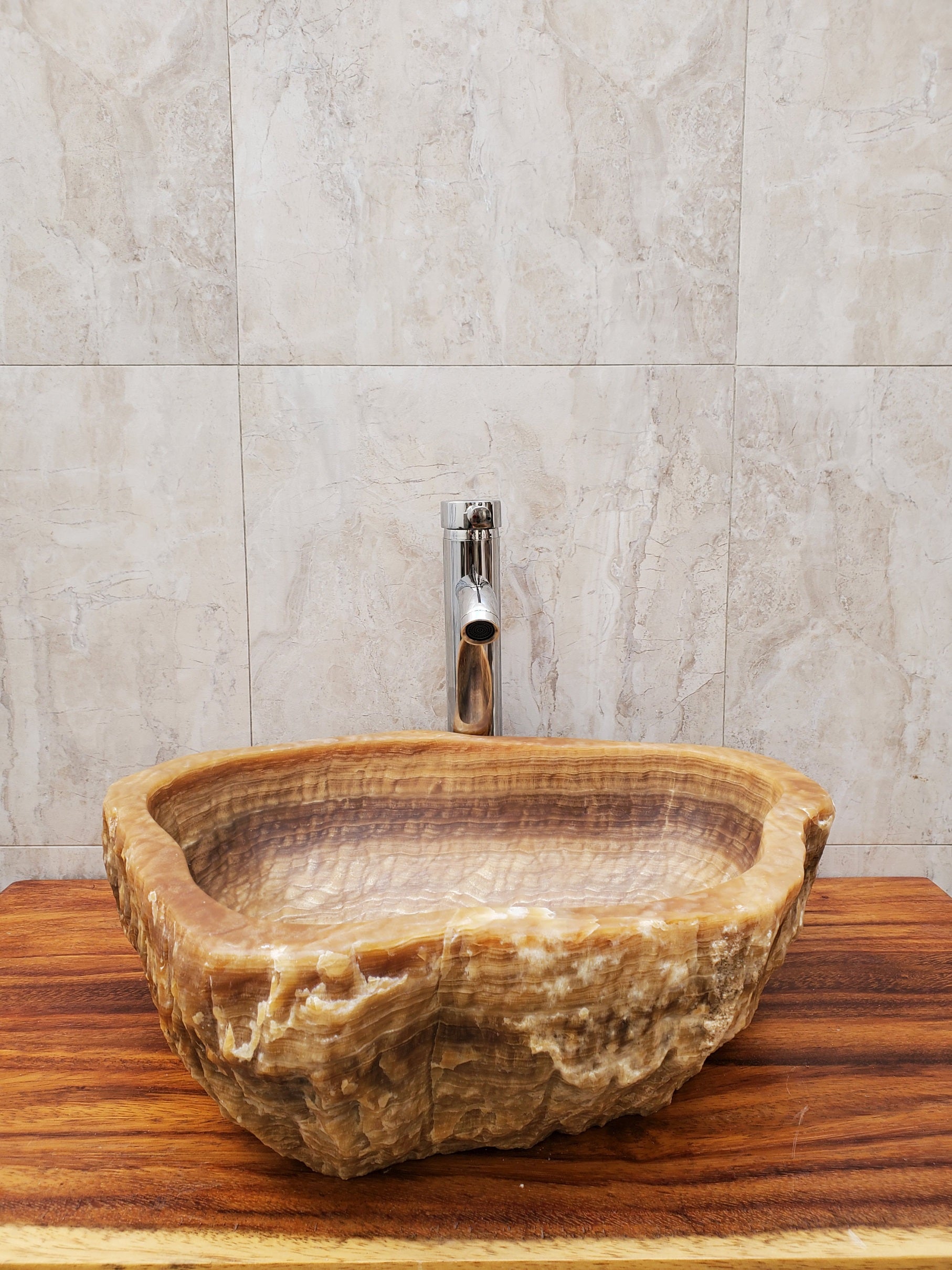 White and Brown Onyx Stone Vessel Sink. It is a one-of-a-kind beautiful work of art. Handmade in Mexico and hand-finished in the USA. Buy now at www.felipeandgrace.com. 