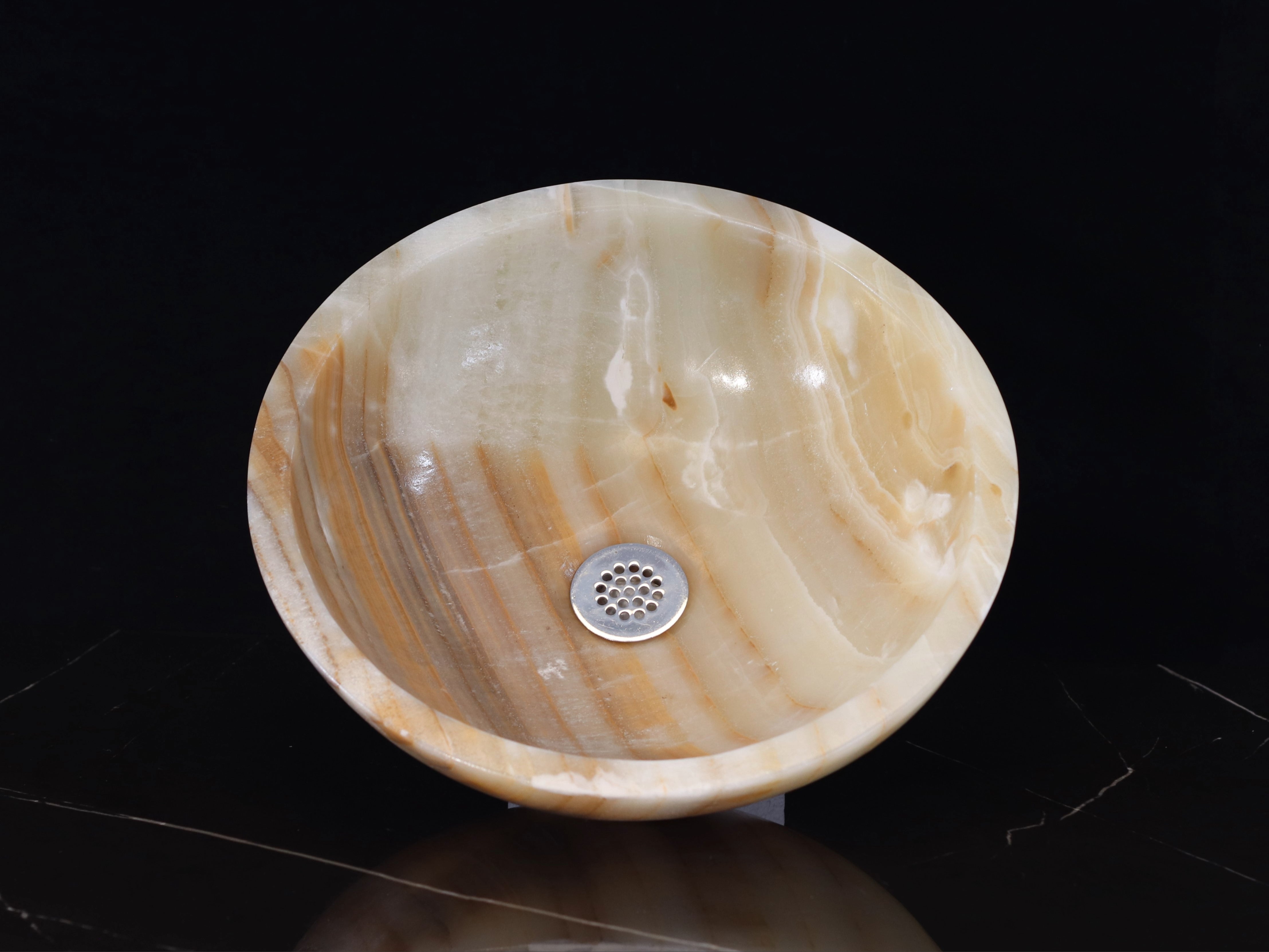 Brown and Tan Onyx Stone Vessel Sink. Made to sit above the counter. This sink has a polished finish. We hand finish, package, and ship from the USA. Buy now at www.felipeandgrace.com. 